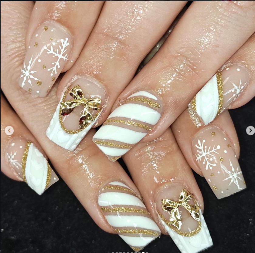 White and Gold Snowflake Nails